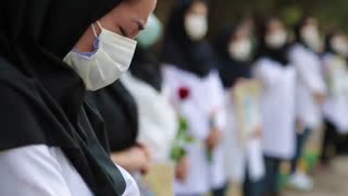 وداع مسوولان استان فارس با شهید مدافع سلامت